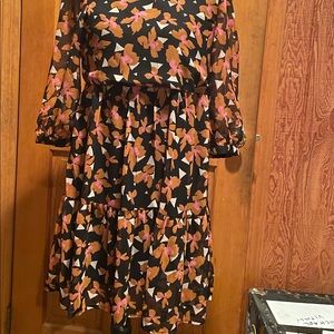 Adorable mini dress made from recycled fibers.